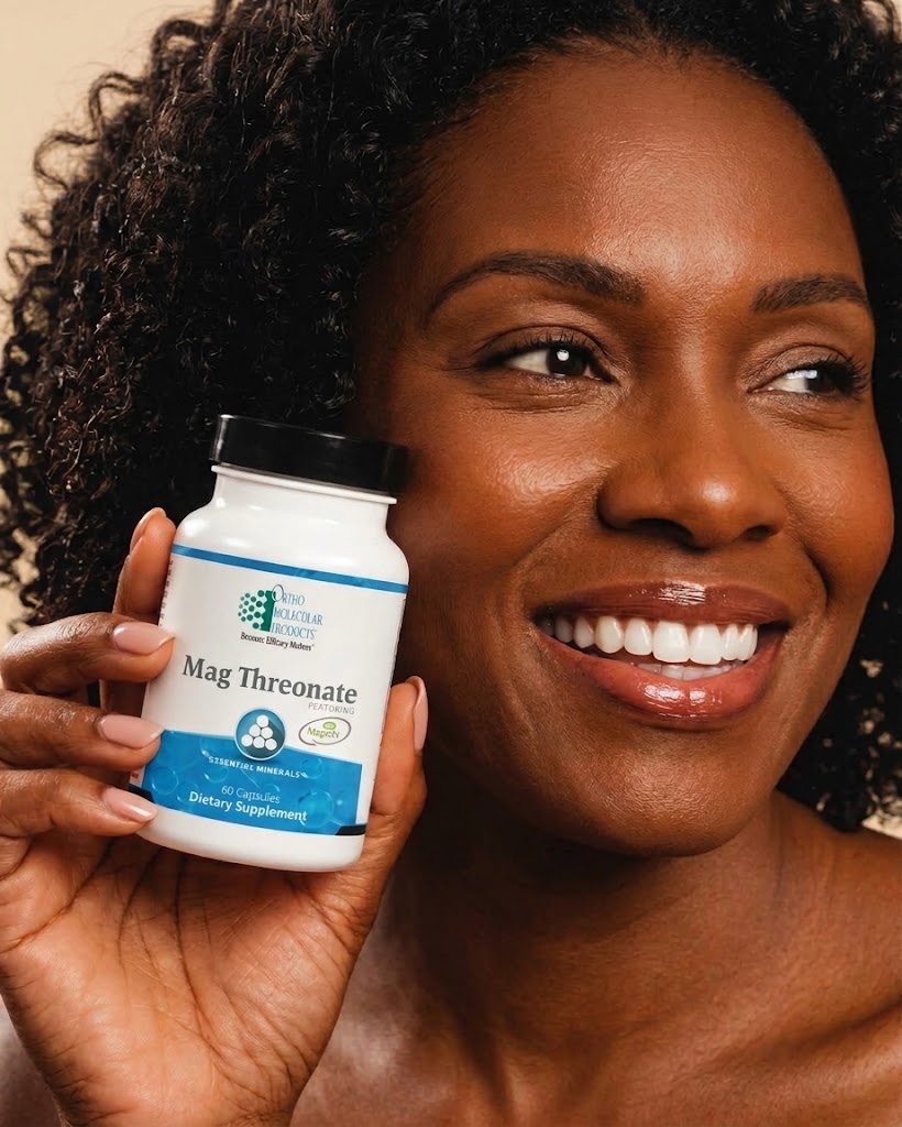 Woman holding a white Mag Threonate bottle by Ortho Molecular Products