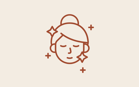 Glowing face icon representing skin assessment